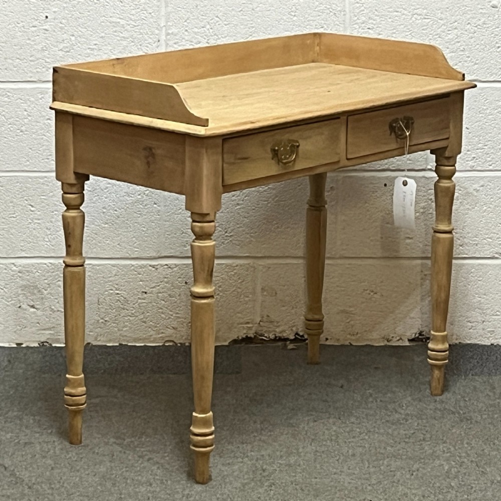 Small Edwardian pine side table with turned legs and 2 drawers View II