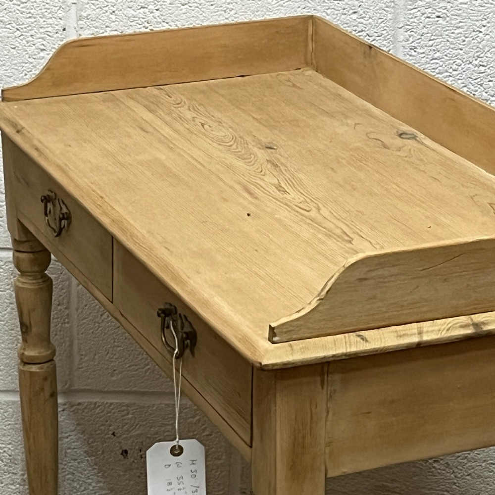 Small Edwardian pine side table with turned legs and 2 drawers View IV