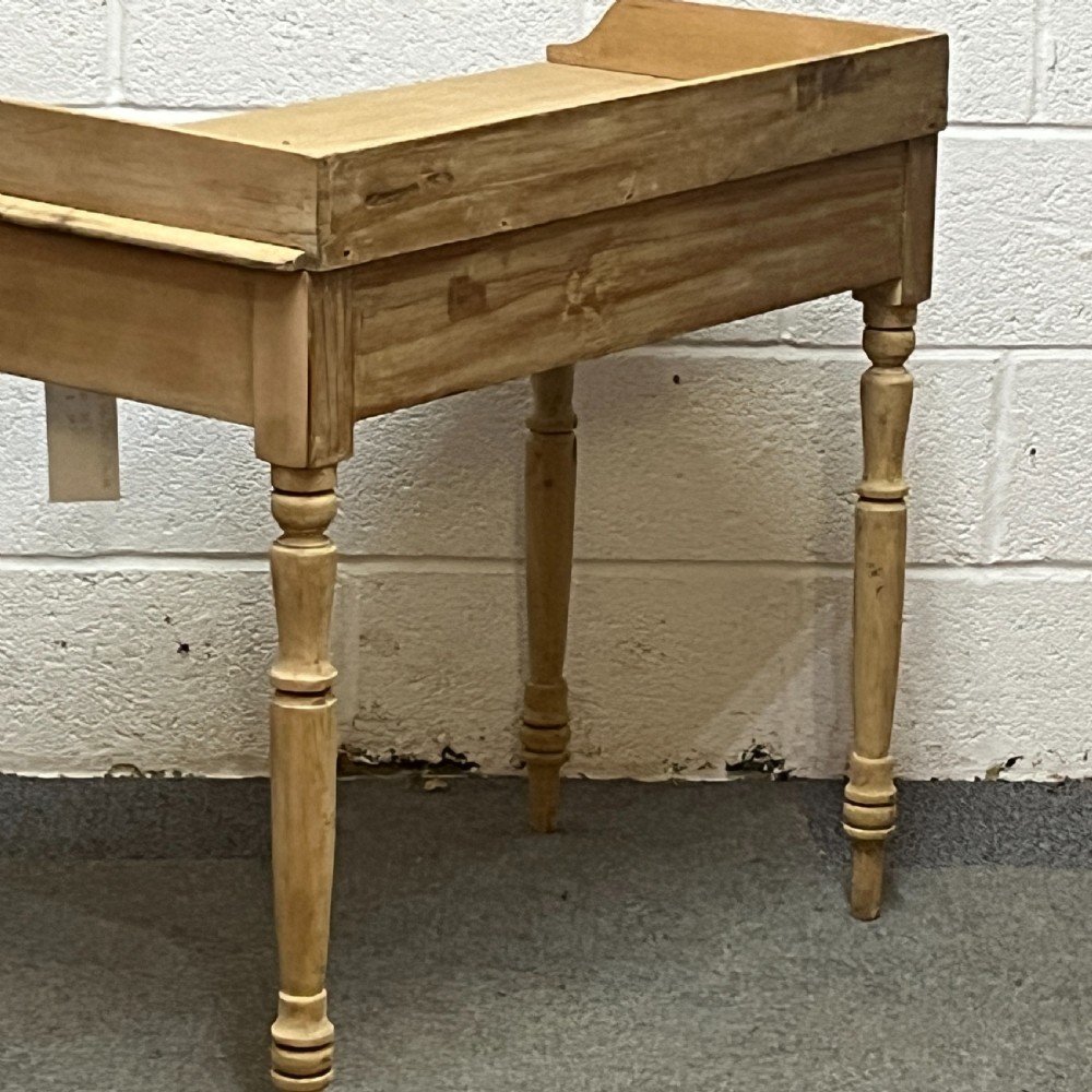Small Edwardian pine side table with turned legs and 2 drawers View V