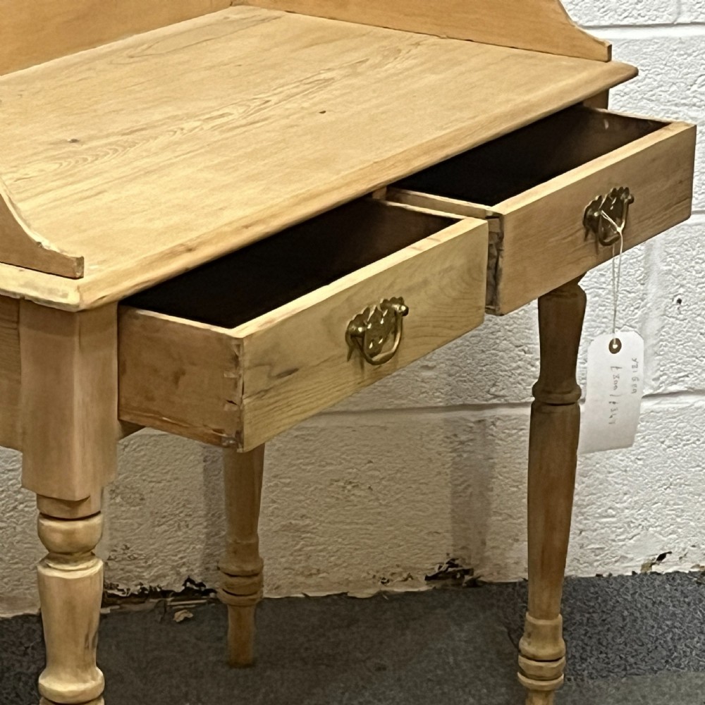 Small Edwardian pine side table with turned legs and 2 drawers View VI