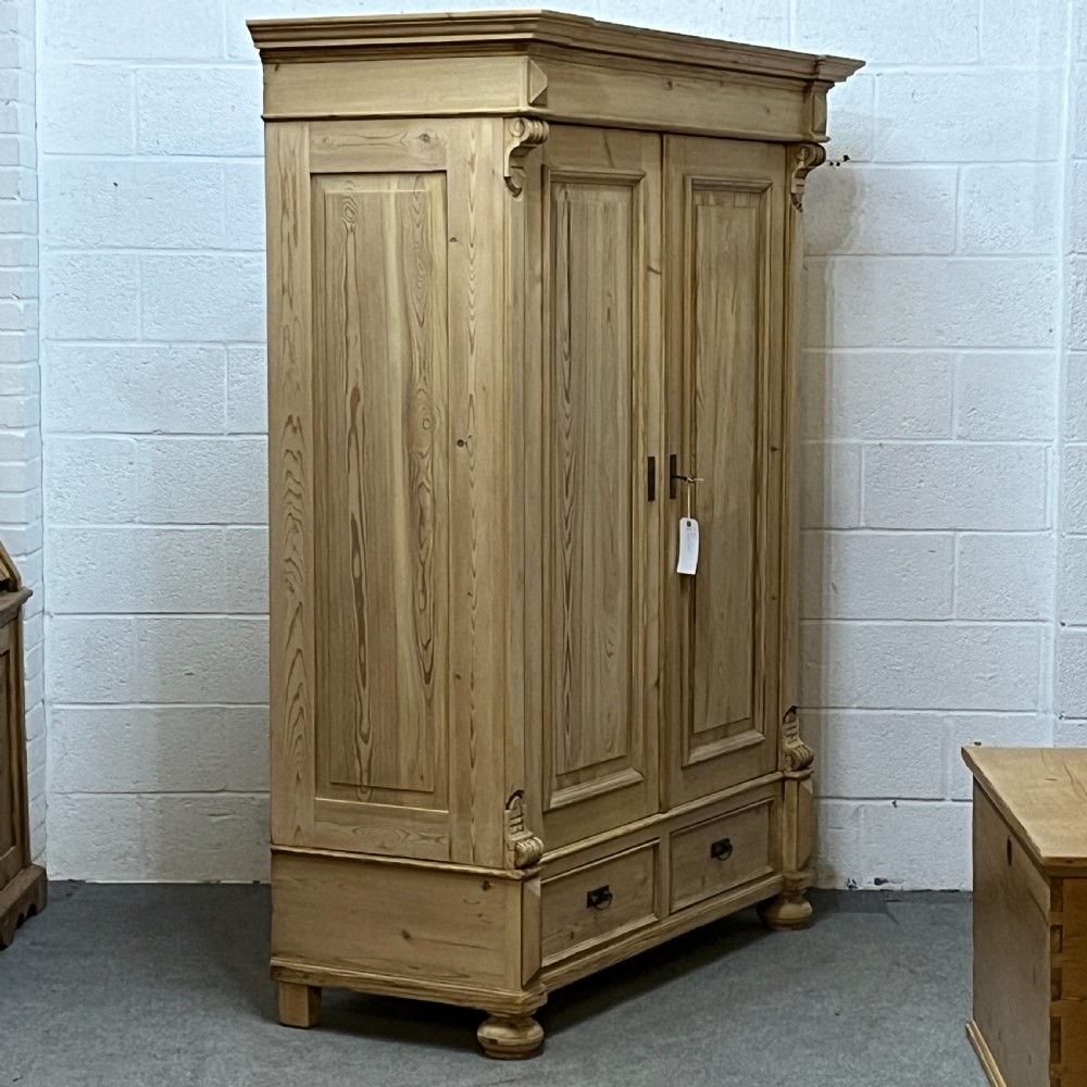 Double Antique Pine Wardrobe With Bottom Drawers (Dismantles) View III