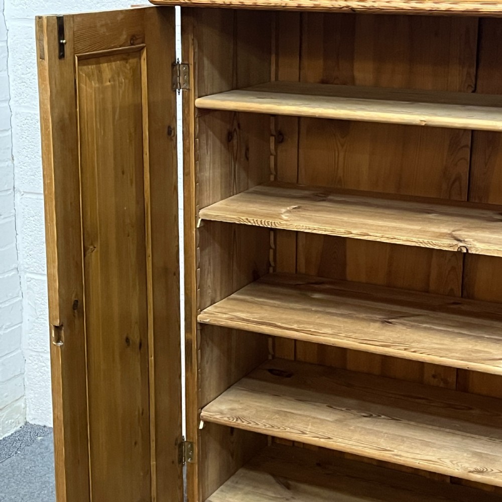 Tall Slim Waxed Pine 2 Door Cupboard With Top Drawer View IX