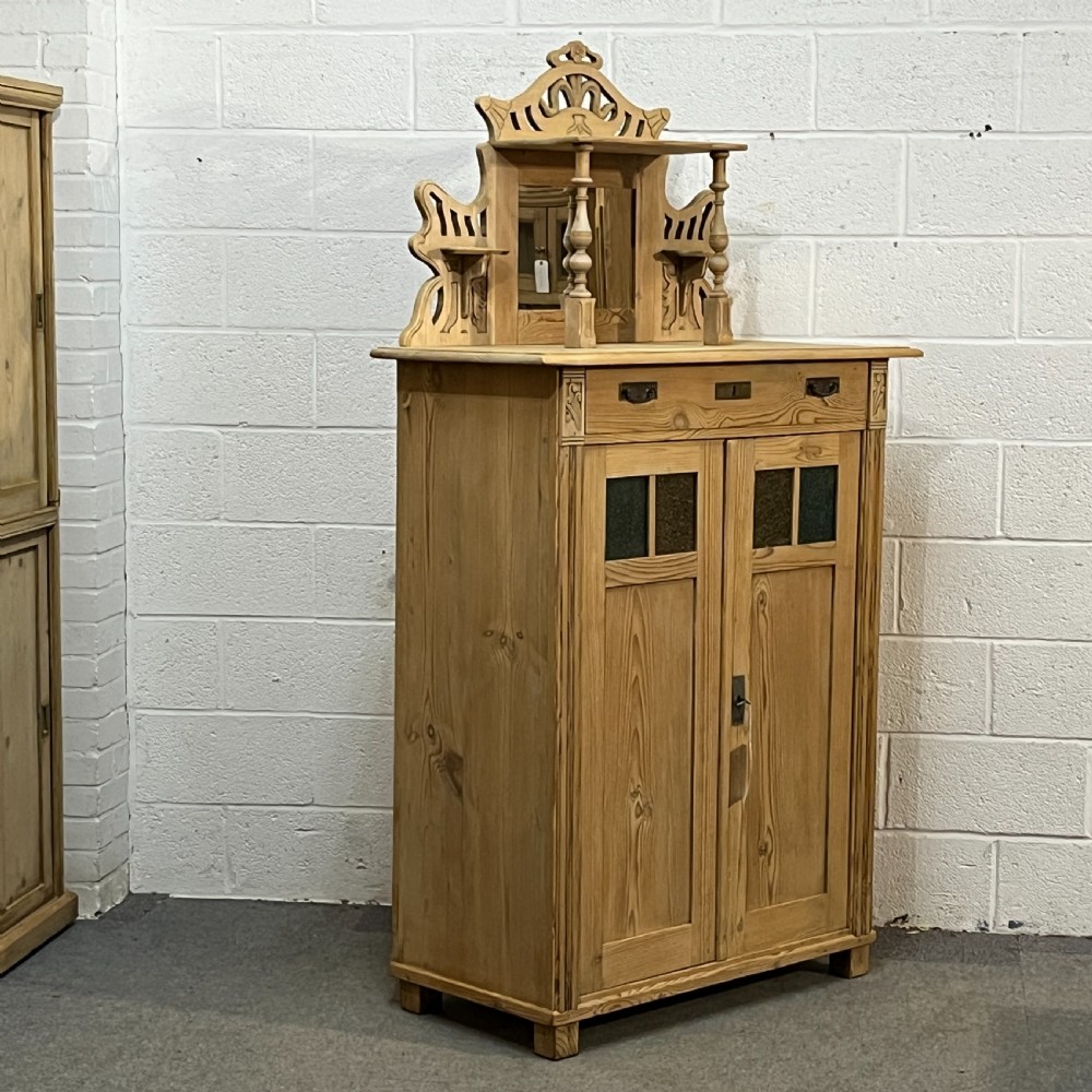 Tall Antique Pine Cupboard With Decorative Top View II