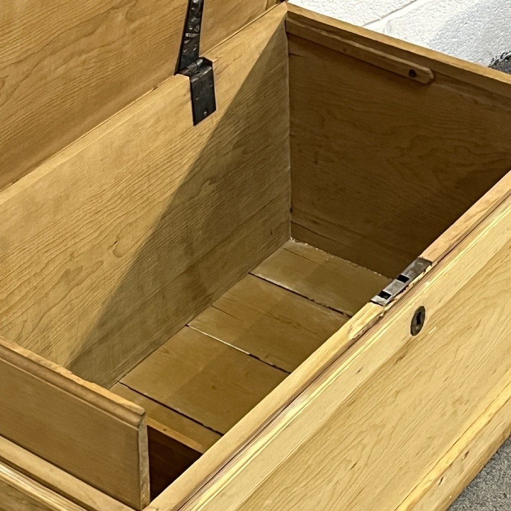 A large rectangular natural pine blanket chest featuring dovetailed joints, a hinged top lid, and a central keyhole escutcheon. View VIII
