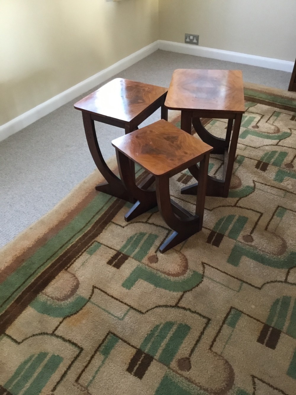 A nest of three Walnut Art Deco side tables. View V