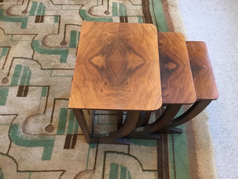 A nest of three Walnut Art Deco side tables. View VI