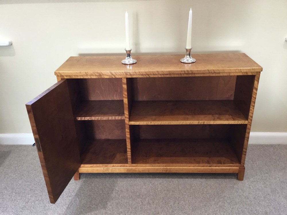 An Art Deco Swedish Low Bookcase and side cupboard. View V