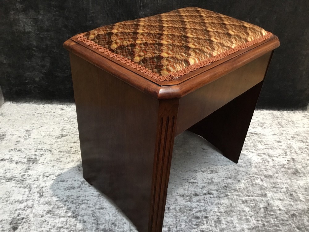 An Art Deco Walnut Piano Stool