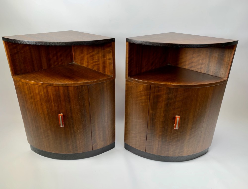 A Pair of Art Deco Corner Cabinets