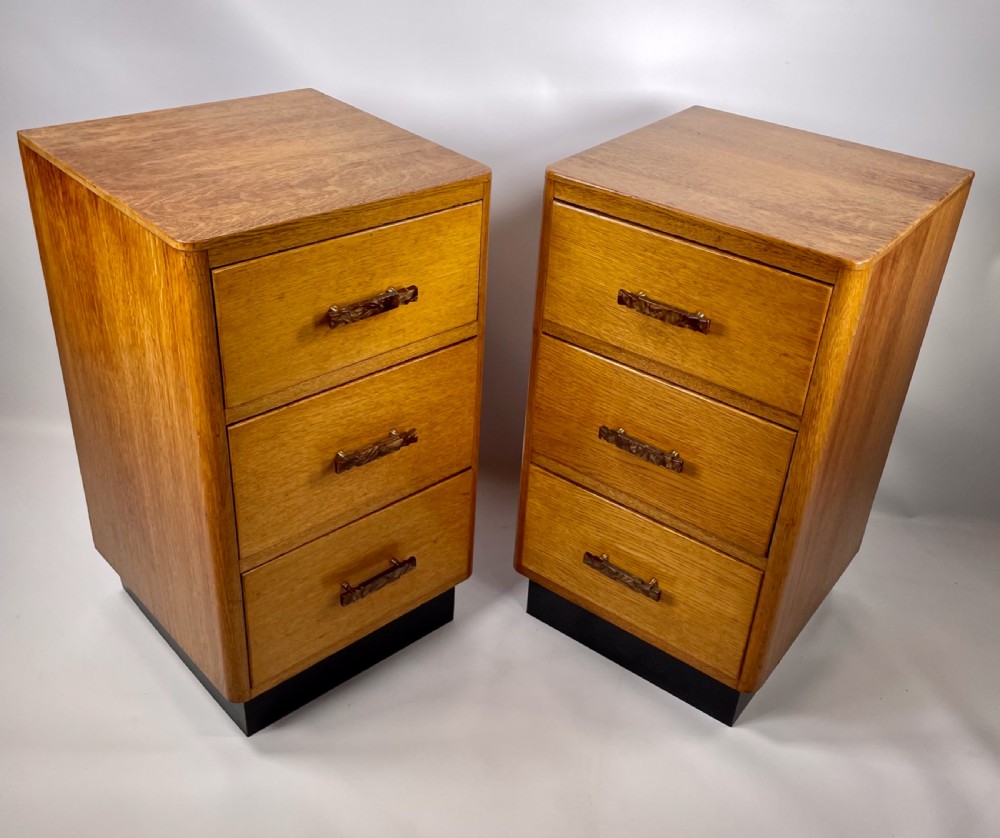 A Pair of Art Deco Oak Bedside Cabinets