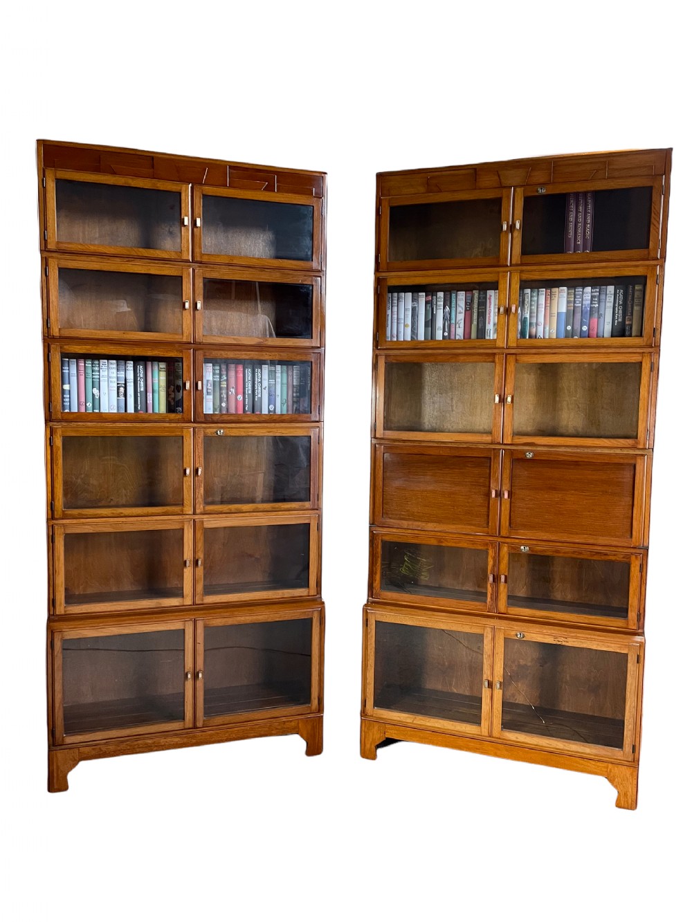 A Pair of Art Deco Walnut Bookcases