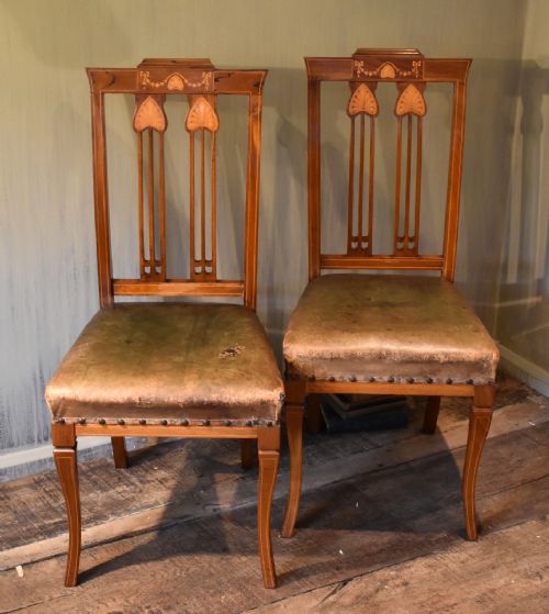 RARE PAIR OF AFRICAN GOLDEN WALNUT CHAIRS - ADDITIONAL PHOTO 1