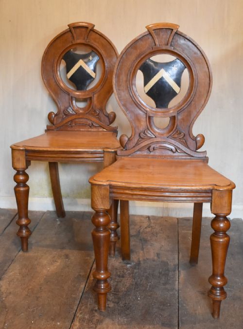 pair of victorian oak hall chairs with painted heraldic panels - CATEGORY: ANTIQUE CHAIRS - DATED 1850