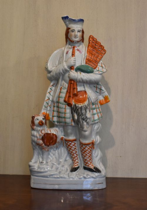 large staffordshire flat back scottish piper with dog - CATEGORY: ANTIQUE CERAMICS - DATED 1880