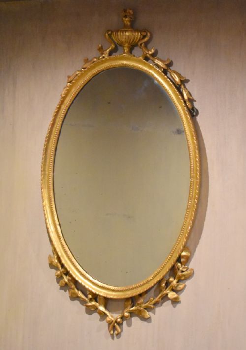 fine oval carved giltwood mirror - CATEGORY: ANTIQUE MIRRORS - DATED 1870
