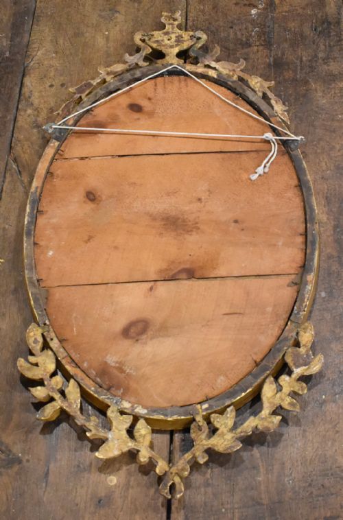 FINE OVAL CARVED GILTWOOD MIRROR - ADDITIONAL PHOTO 10
