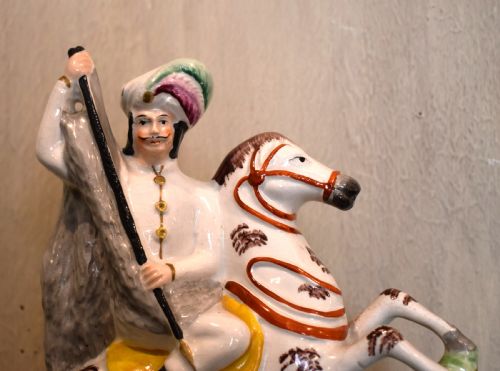 RARE STAFFORDSHIRE FIGURE OF A LEOPARD HUNTER - ADDITIONAL PHOTO 1
