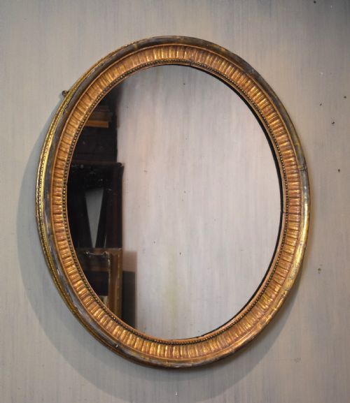 large early nineteenth century oval gilt mirror - CATEGORY: ANTIQUE MIRRORS - DATED REGENCY