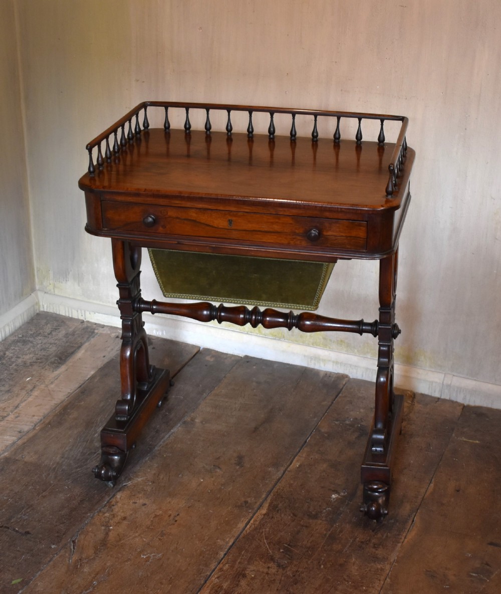 Fine late Regency rosewood sewing and writing table