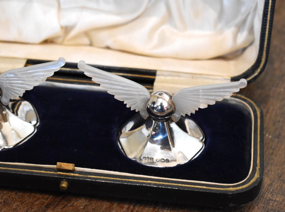 Unusual boxed pair of silver winged knife rests View III