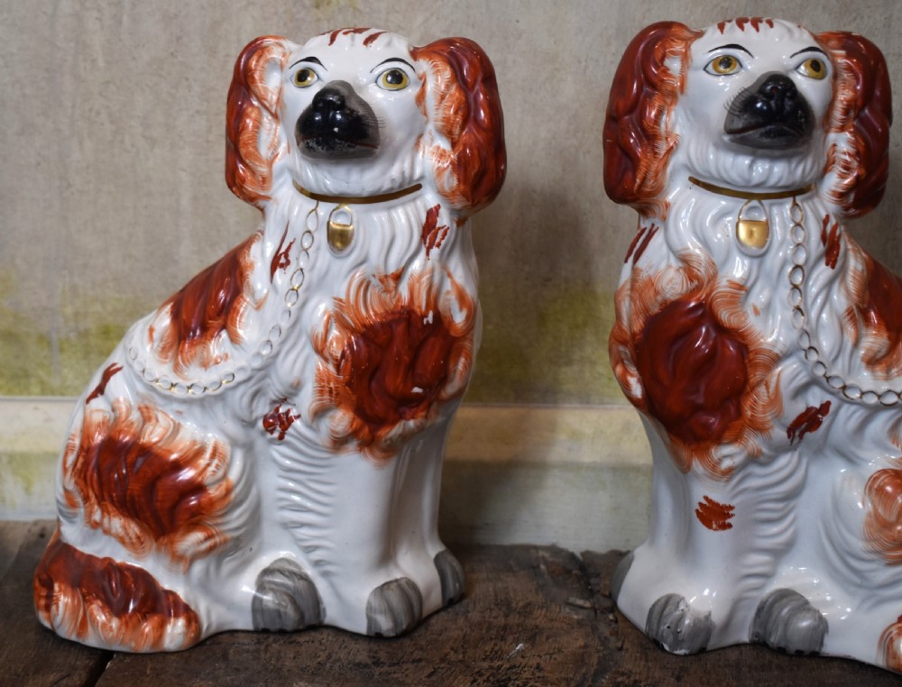 Fine pair of Victorian Staffordshire spaniel dogs View II