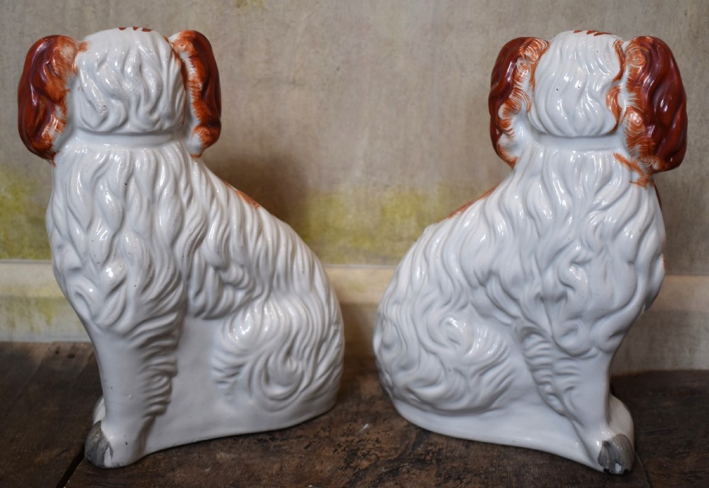 Fine pair of Victorian Staffordshire spaniel dogs View V