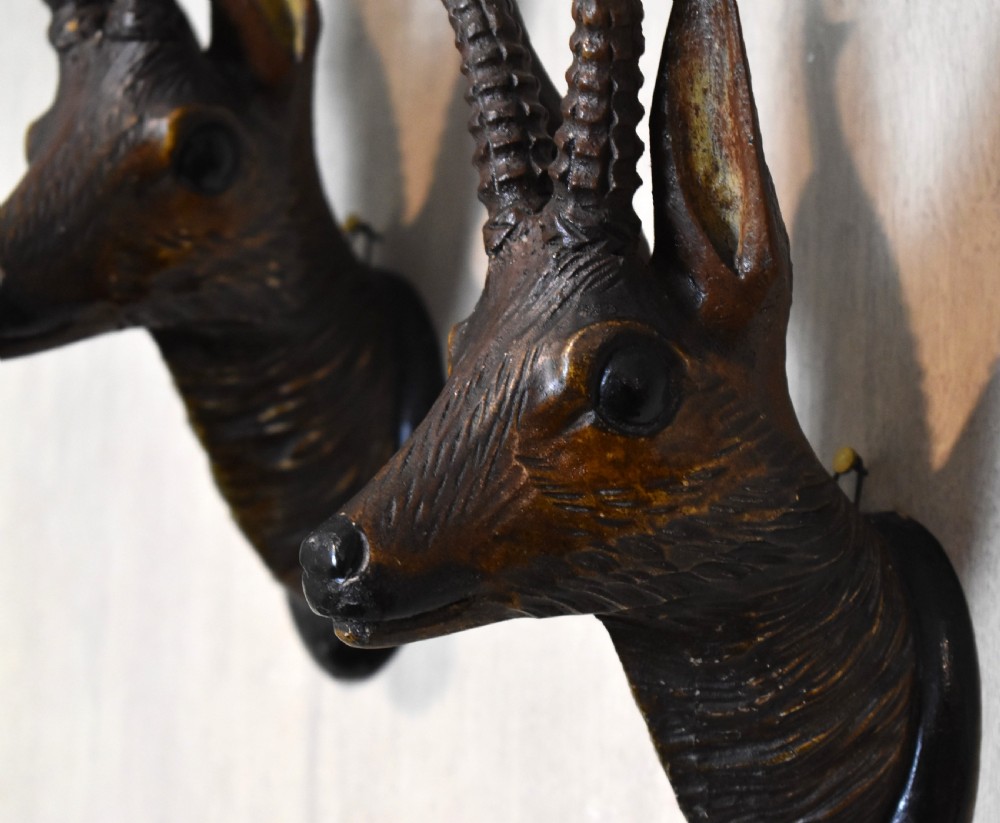 A pair of Black Forest carved wood deer heads View IV