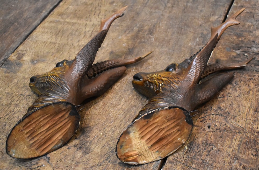 A pair of Black Forest carved wood deer heads View VI