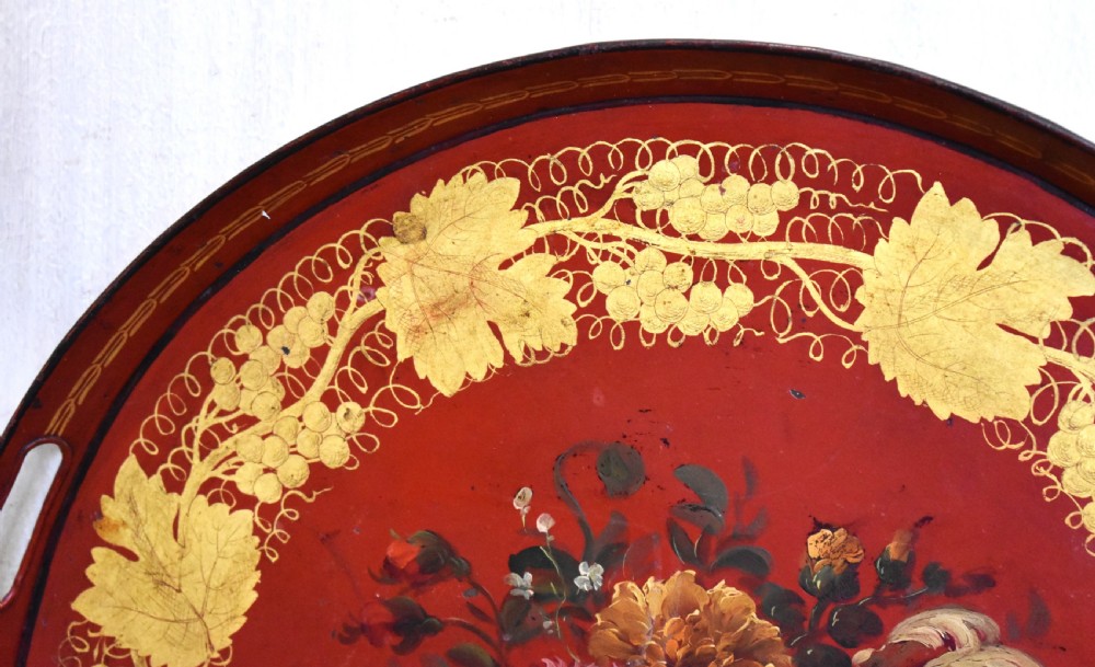 Red toleware tray painted with flowers View III
