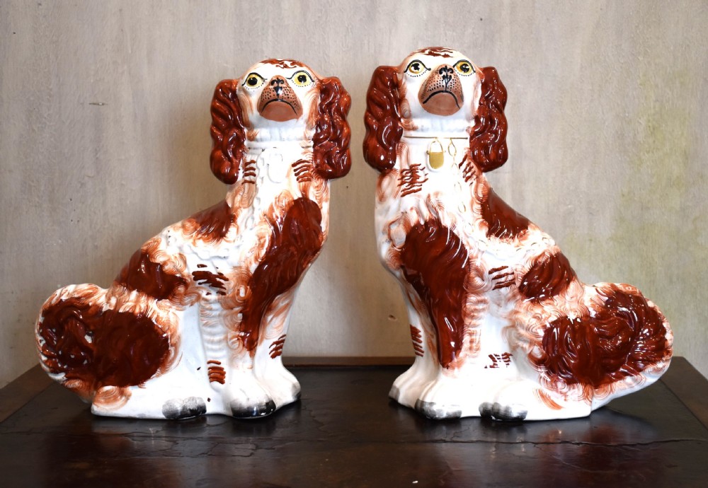 Fine Pair of Staffordshire pottery dogs