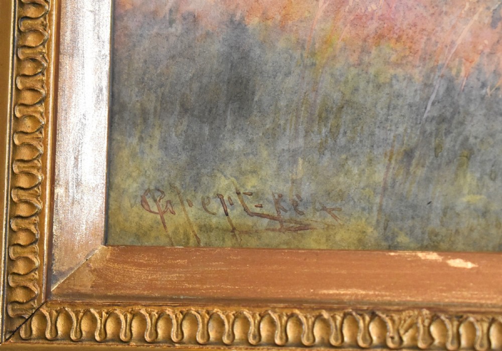 A framed watercolour painting depicting hay stooks in a field overlooking a blue bay under a cloudy sky, presented in a decorative gilt frame. View V