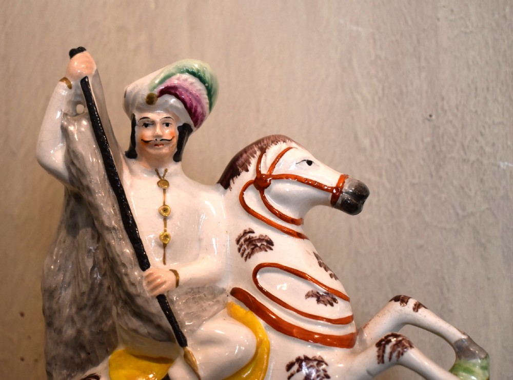 Rare Staffordshire figure of a leopard hunter View II