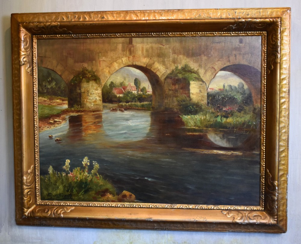 A framed oil painting featuring a large stone arch bridge over a river with reflections and a distant village. View II