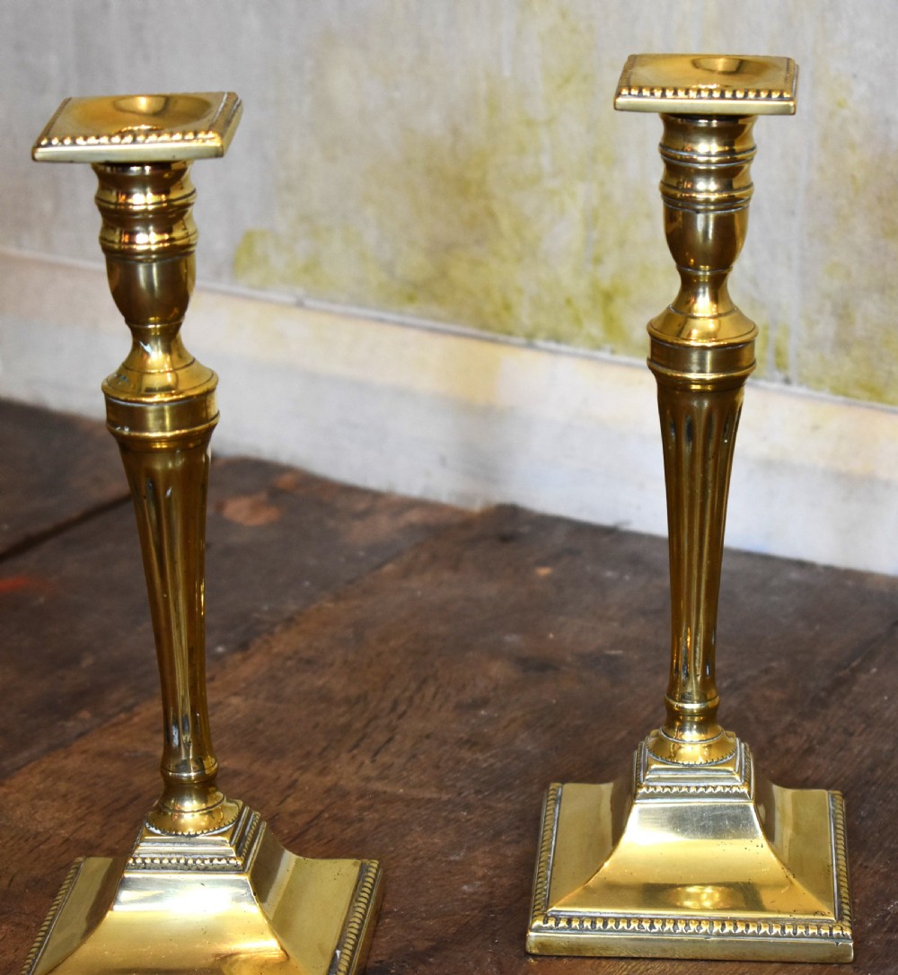 Fine pair of Georgian brass candlesticks View II