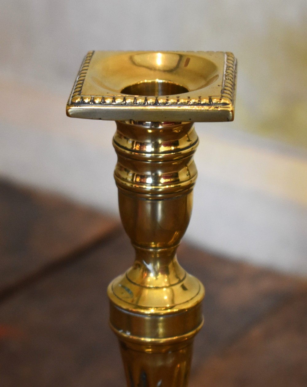 Fine pair of Georgian brass candlesticks View III