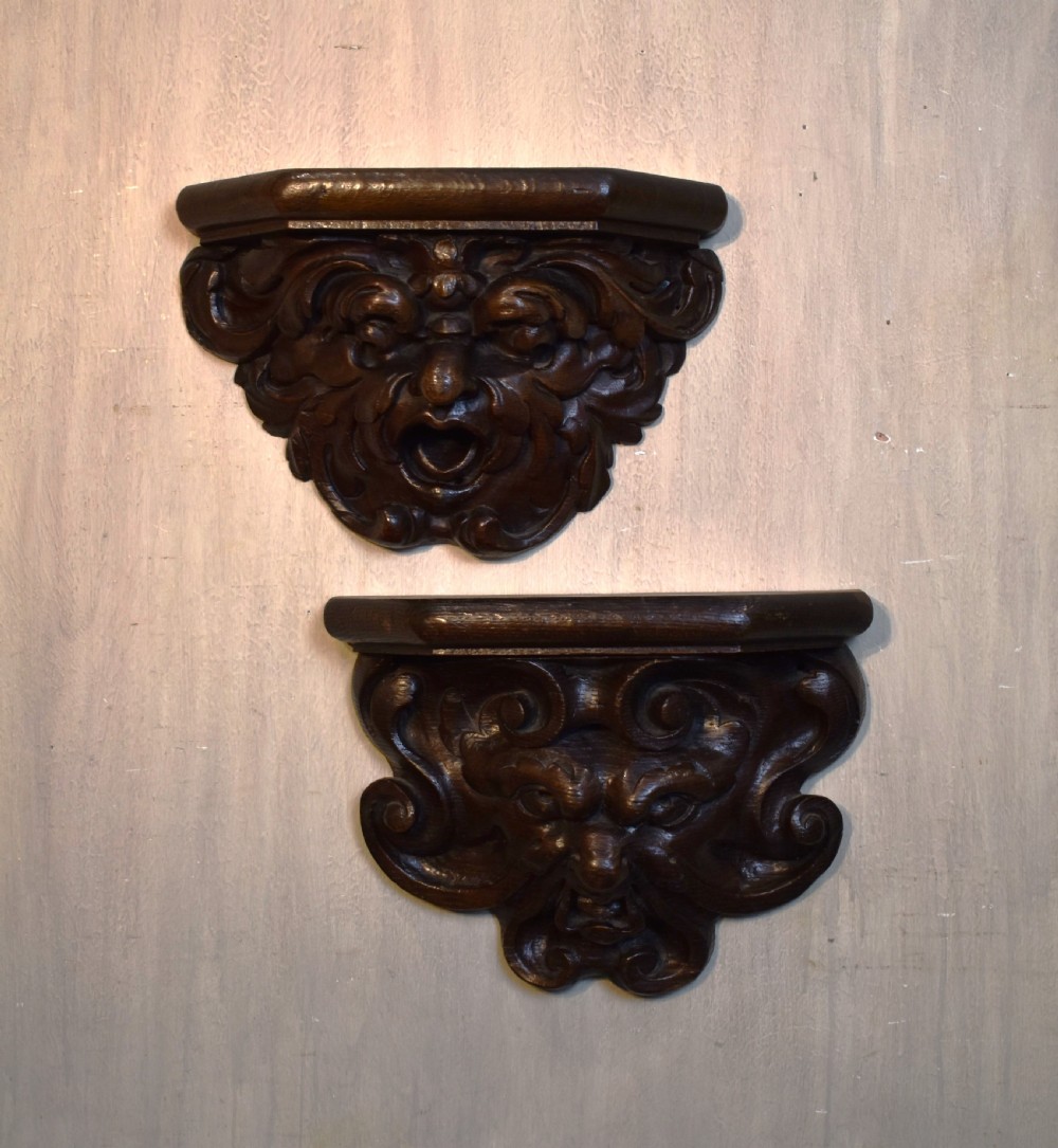 Pair of Gothic Revival oak wall brackets