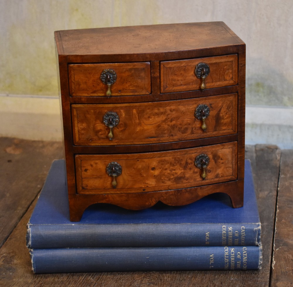 Superb miniature burr elm bowfront chest of drawers