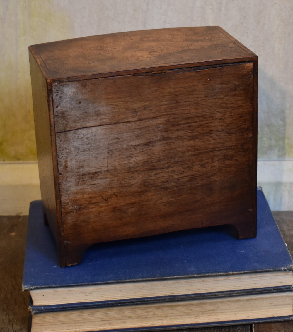 Superb miniature burr elm bowfront chest of drawers View V
