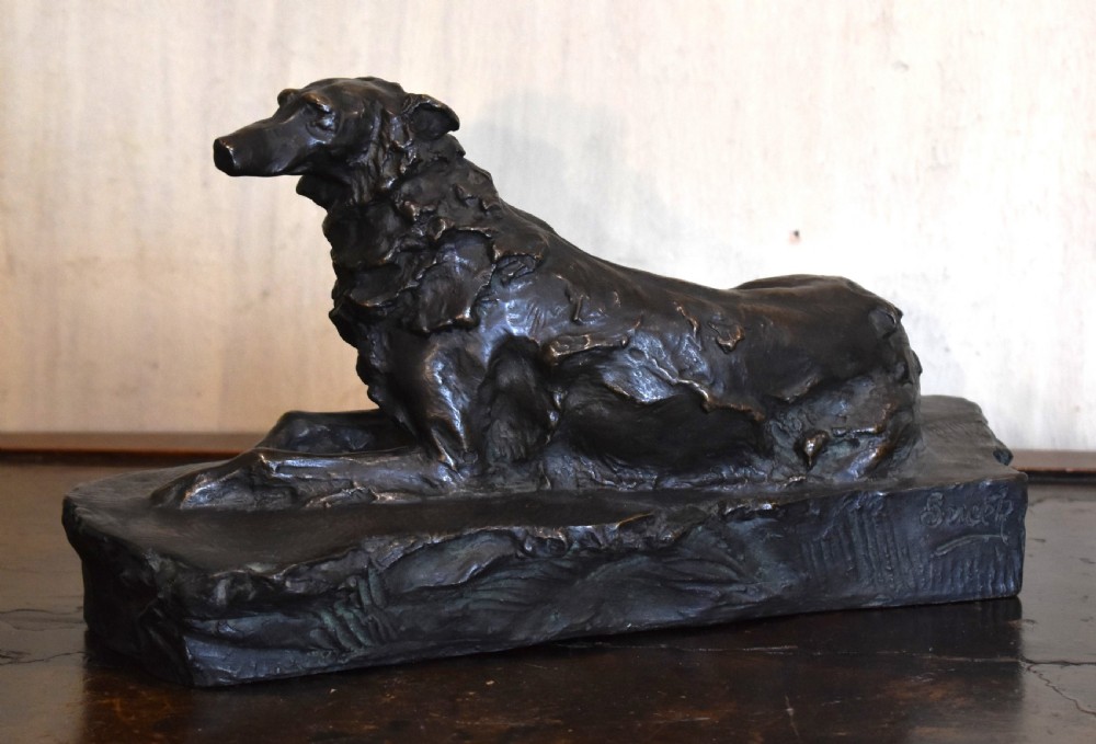 Fine bronze of a reclining dog