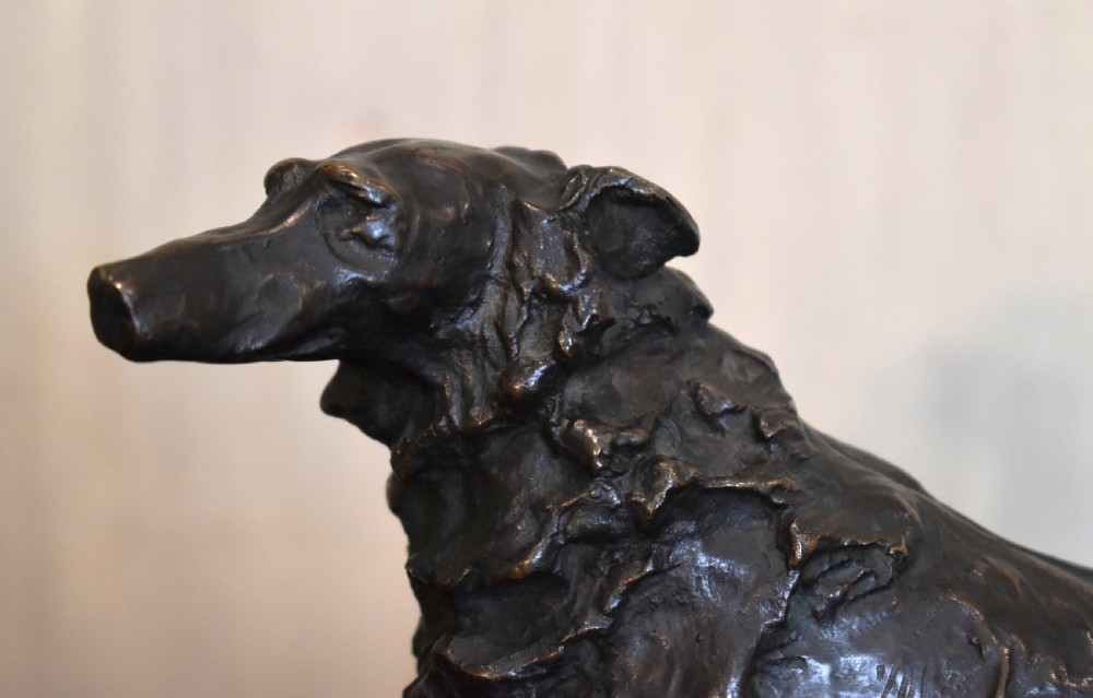 Fine bronze of a reclining dog View V