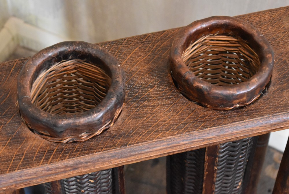 Unusual oak and wicker stick stand View V
