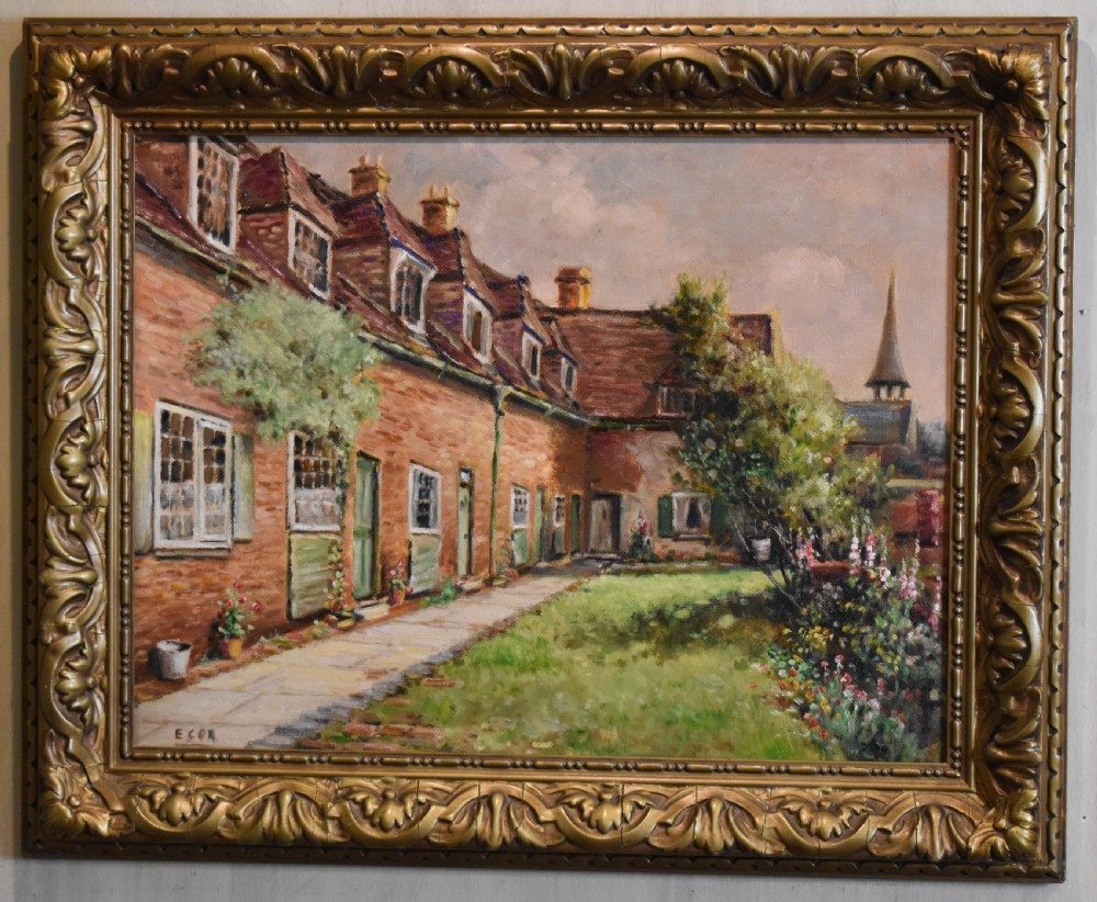 A framed oil painting depicting a row of brick cottages with green shutters alongside a garden path, enclosed in an ornate gilded frame. View II