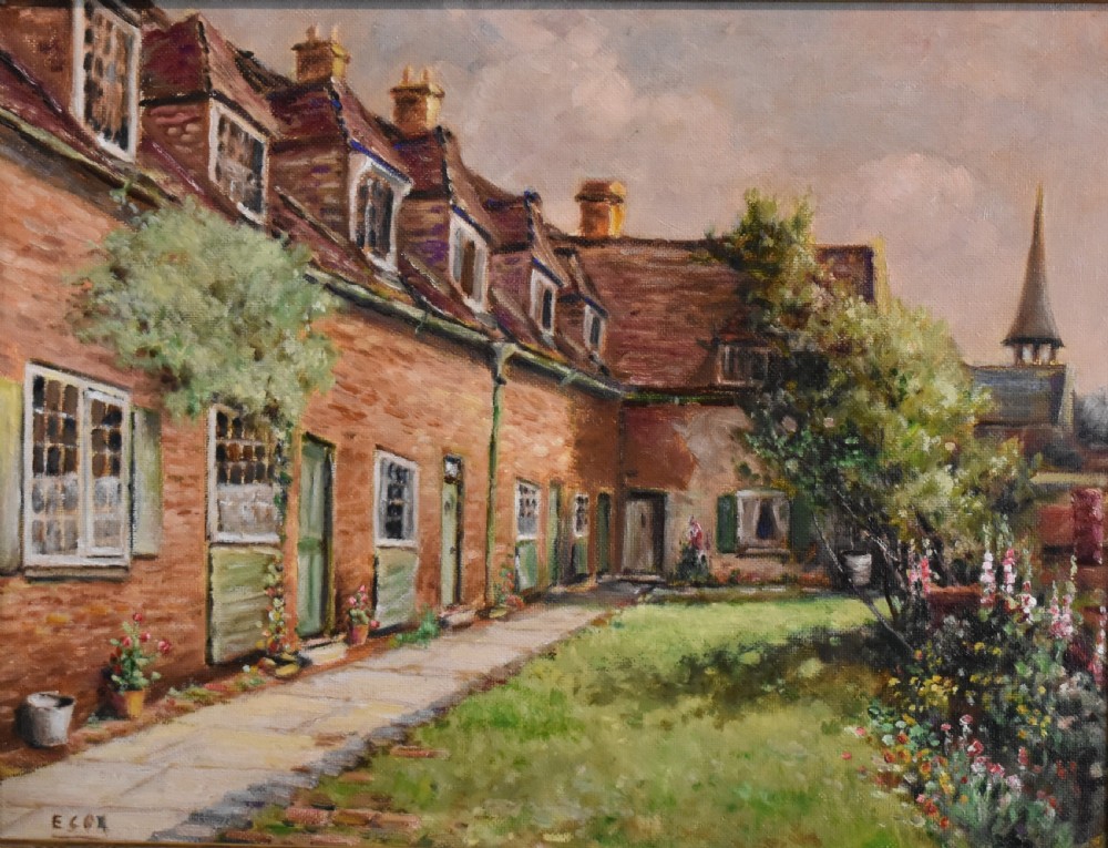 A framed oil painting depicting a row of brick cottages with green shutters alongside a garden path, enclosed in an ornate gilded frame. View VI
