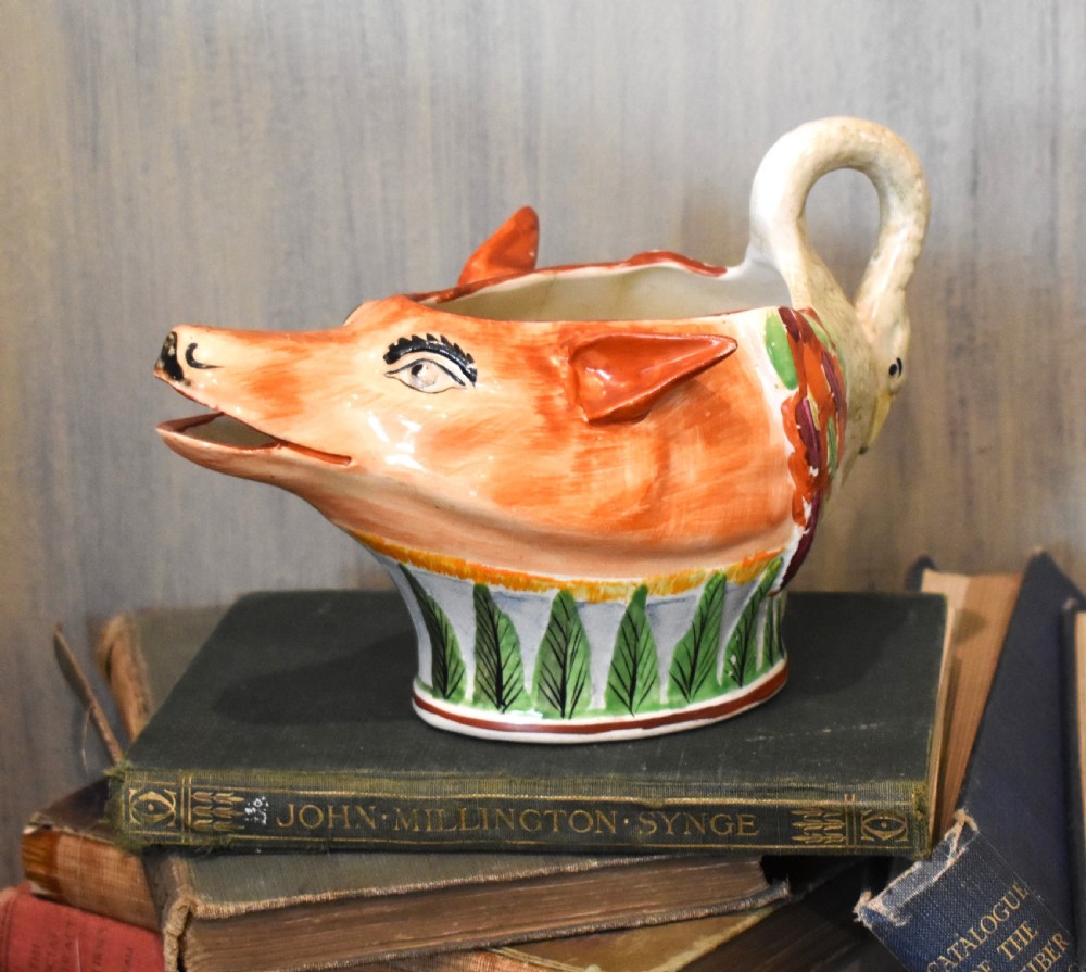 Early Staffordshire pottery fox and swan sauceboat