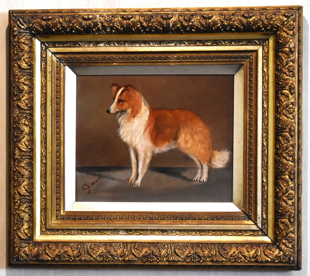 An oil painting of a sable and white Rough Collie standing in profile, set within an ornate gilded wood frame. View II