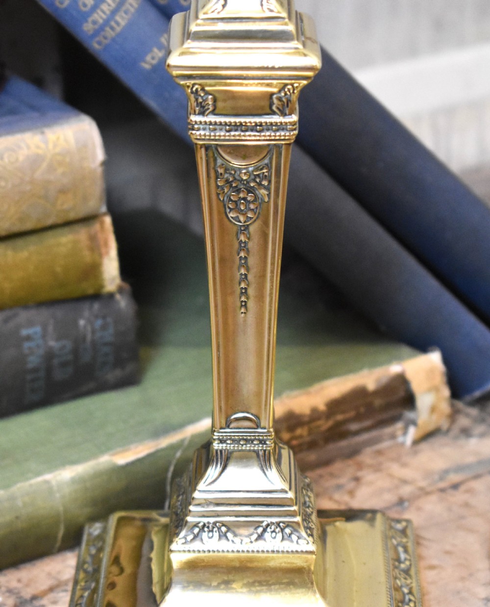 Pair of military related brass candlesticks View IV