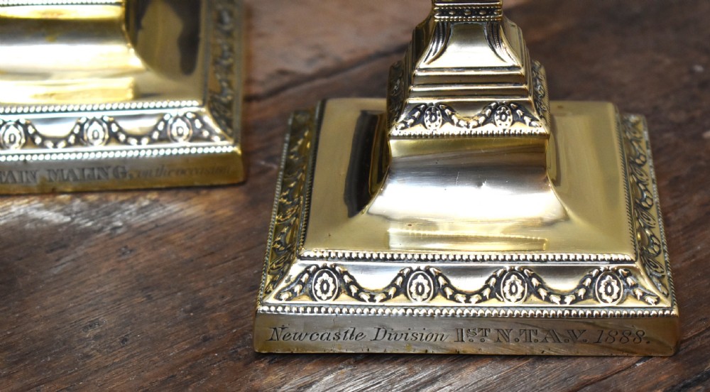 Pair of military related brass candlesticks View VII