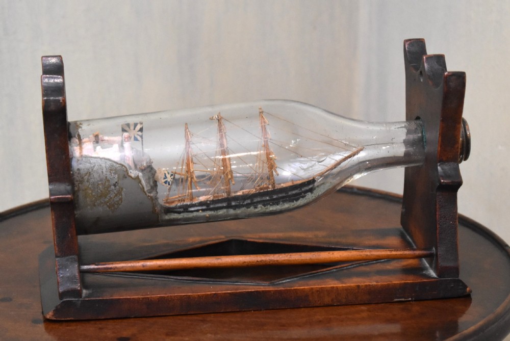 Ship in a bottle on stand View III