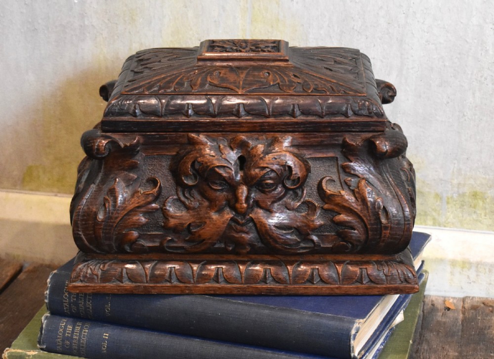Green man carved oak Gothic revival casket