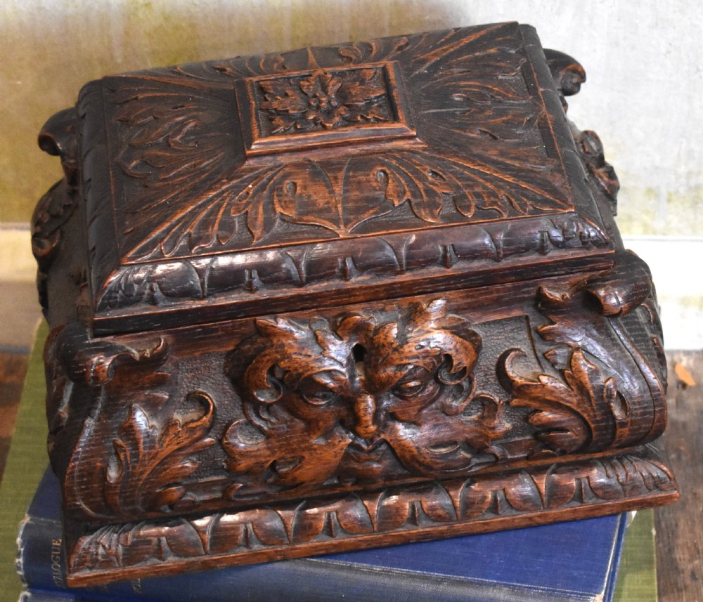 Green man carved oak Gothic revival casket View II